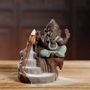 Lord Ganesha purple clay backflow incense burner with mountain waterfall smoke effect