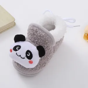 Close-up of grey plush baby walking shoes with cute panda embroidery detail
