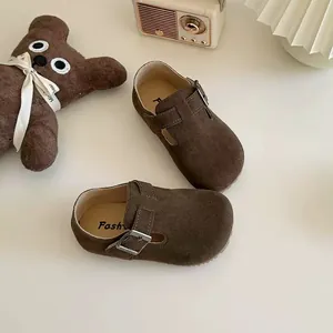 Classic brown suede Birkenstock-style clogs for toddlers with adjustable buckle straps