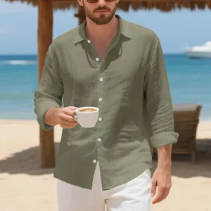 Detail of olive green men's linen long sleeve shirt in beach lifestyle setting