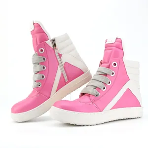 Detail of pink and white high-top sneakers with thick laces and side zipper