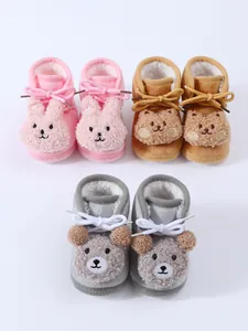 Three pairs of cute plush baby booties featuring bear and rabbit faces with warm fleece lining