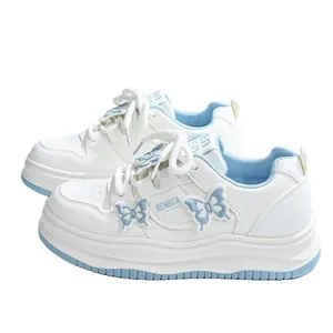 Girls sweet white sneakers with light blue butterfly decor and breathable platform sole