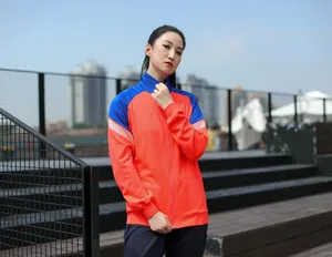 Veste de sport grande taille avec design color block orange et bleu vif pour plein air