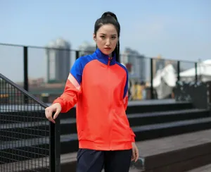 Veste de sport zippée bicolore orange et bleue pour le fitness et la course à pied