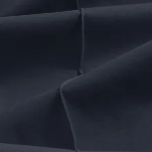 Detailed view of high-quality navy blue fabric texture and stitching on men's trousers
