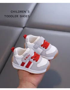 Detailed view of 1-3 year old soft-soled breathable toddler shoes in grey and red finish