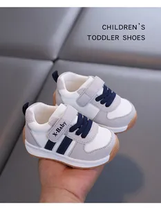 Close-up of breathable grey and white toddler shoes with soft non-slip soles