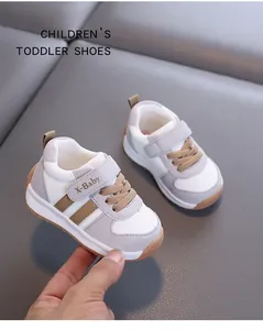 Close-up of grey and white breathable mesh toddler shoes featuring non-slip soft soles