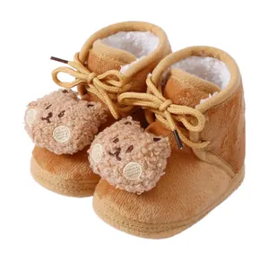 Warm brown plush baby winter boots with cute bear design and soft fleece lining
