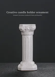 Close-up detail of a ceramic Roman pillar candle holder with a white speckled glaze
