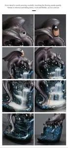 Macro details of a ceramic winged dragon backflow incense burner showing smoke flow effect