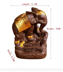 Detailed view of the purple clay elephant backflow incense burner with gold decorative accents