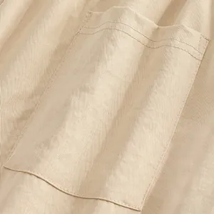 High-quality close-up showing the khaki fabric texture and pocket detail of men's casual pants.