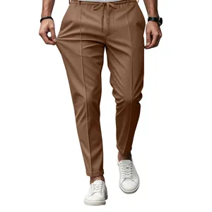 Close-up showing the elastic drawstring waist and tapered fit of men's trousers.