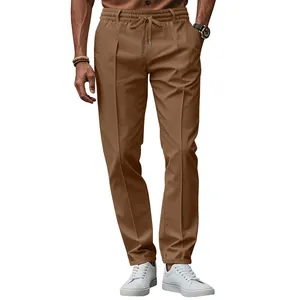 Detail showing the pleated front and drawstring waist of brown men's casual trousers