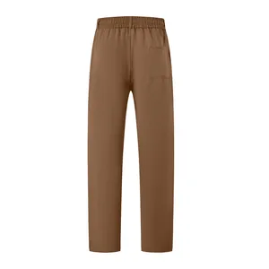 Back view detail of men's solid brown casual trousers with elastic waist and back pocket.
