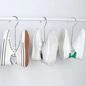 Durable stainless steel shoe drying rack hanging multiple pairs of white sneakers