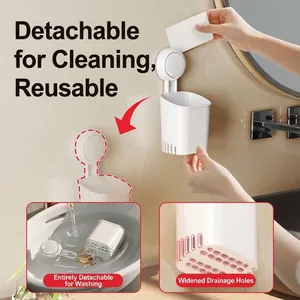 Wall-mounted suction cup toothbrush holder with widened drainage holes for bathroom