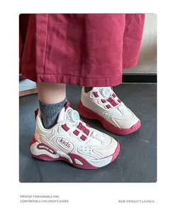 Detail view of girl's breathable red and white mesh sneakers with rotary lace system.