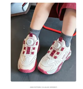 Close-up of girls' breathable mesh sneakers with white and red sporty design