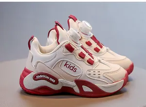 Detailed view of white and red girls' breathable mesh running shoes with rotary buckle.