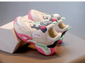 Close-up of children's breathable sneakers featuring a convenient rotary dial lacing system.