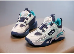Detailed close-up of breathable kids sports sneakers with a rotary dial lacing system