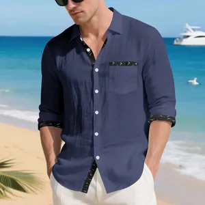 Detailed close-up of navy blue linen men's casual shirt featuring bird print accents
