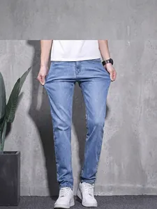 Comfortable men's light blue slim fit stretch denim jeans for casual everyday wear