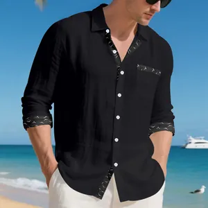 Close-up view of a black men's linen shirt featuring stylish patterned trim on cuffs and pocket