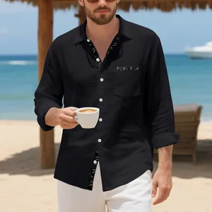 Lifestyle shot of men's black linen long sleeve shirt with bird print details