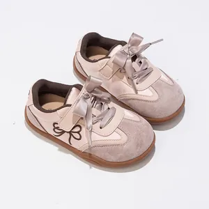 Zapatillas rosas para niña con lazos de cinta de seda y suela blanda