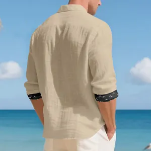Back view of a khaki linen long-sleeve shirt for men with patterned rolled cuffs.