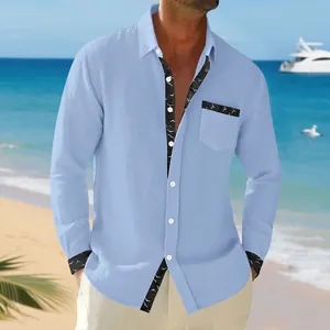 Macro view of light blue linen shirt with seagull print trim on collar and pocket