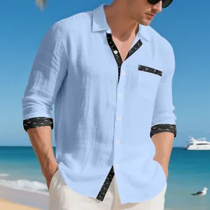 Close-up view of a light blue long-sleeved linen shirt featuring seagull print contrast trim