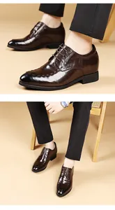 Detail view of brown sheepskin men's elevator dress shoes with polished finish