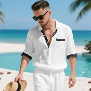 Detail of white linen resort shirt for men with patterned collar and sleeve cuffs