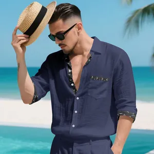 Stylish men's navy blue linen long-sleeve shirt with patterned trim for beach vacation