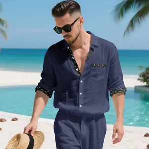 Men's navy blue linen shirt and pants set with patterned trim for tropical beach vacations
