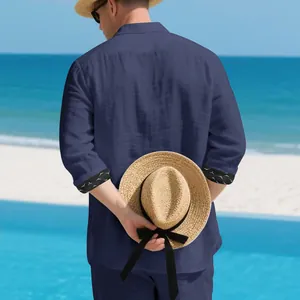 Relaxed fit men's navy blue linen shirt with patterned cuffs for casual beach vacations