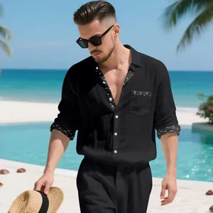 Men's loose black linen shirt with patchwork trim for casual beach vacation.