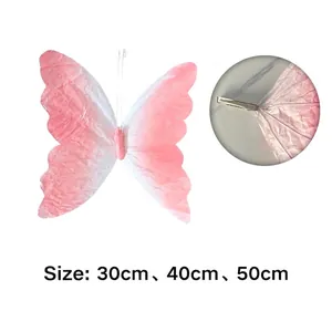 Decoración de mariposa con degradado rosa y clip, disponible en 30cm, 40cm, 50cm.