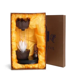 LED backflow incense burner with lotus and monk in a glass windproof cover gift box