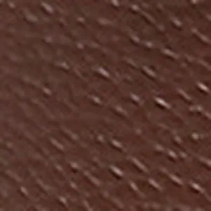Close-up of the pebbled brown leather texture on these stylish women's ankle boots