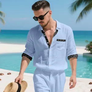 Detail view of men's linen vacation shirt featuring unique bird pattern contrast