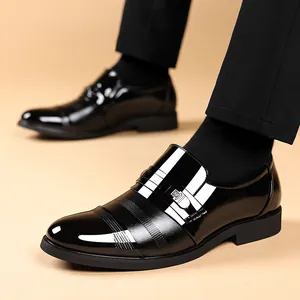 Classic black patent leather men's dress shoes with a glossy finish for business wear