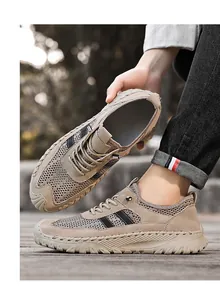 Close-up of breathable men's khaki mesh shoes with durable soft sole for summer outdoor travel