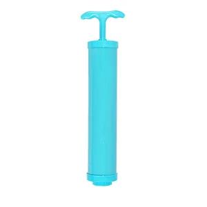 Portable manual air pump for vacuum storage bags in light blue finish