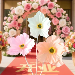 Large handmade DIY crepe paper poppy flowers in macaron colors for mall event decoration